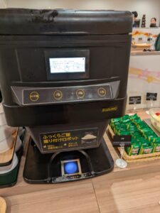 ふっくらご飯盛り付けロボット